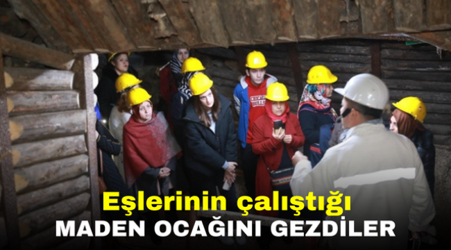 Eşlerinin çalıştığı maden ocağını gezdiler